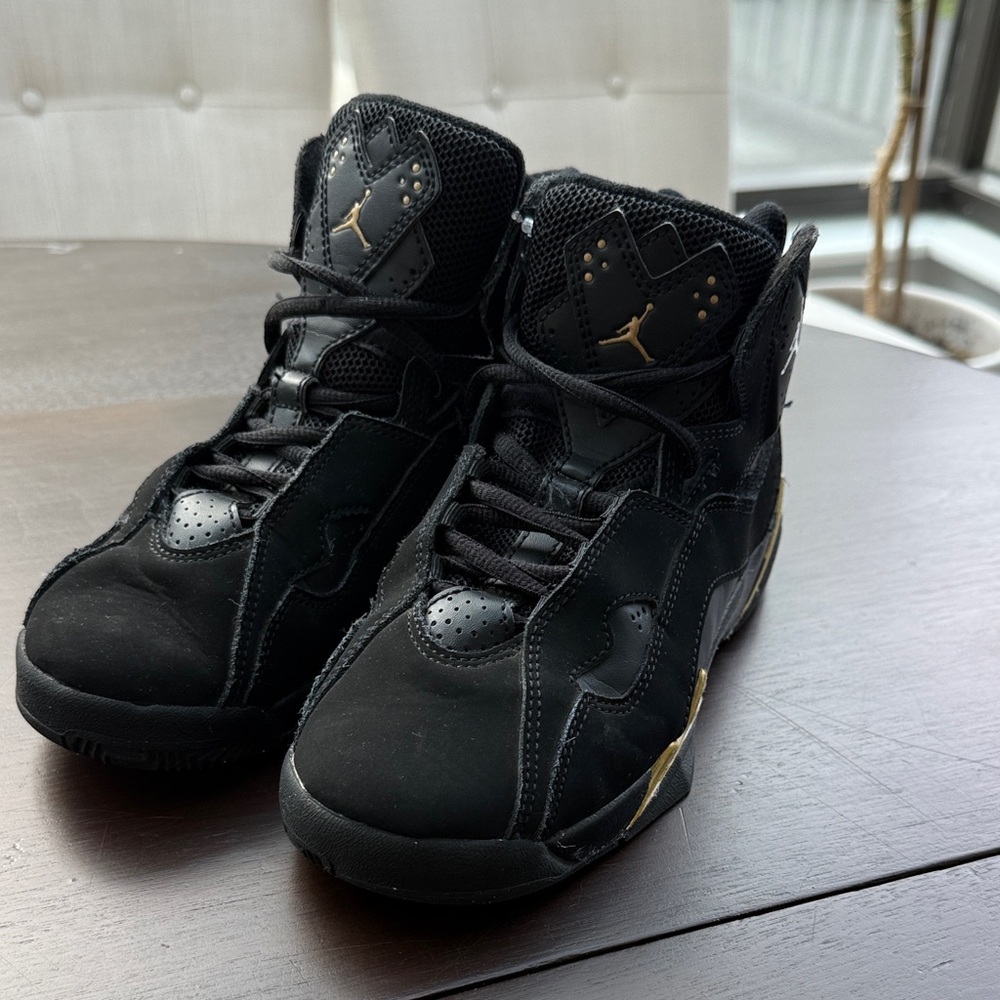 Nike Jordans Kids Black and Gold High-Top sneakers